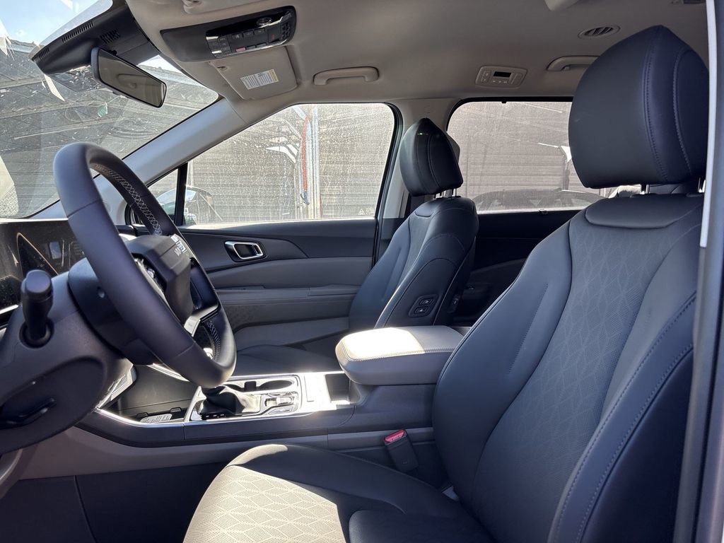 New 2027 Ivory Silver Kia  image 13