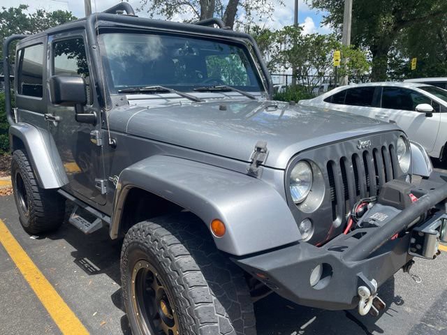 Used 2015 Billet Silver Metallic Clearcoat Jeep Freedom Edition image 2